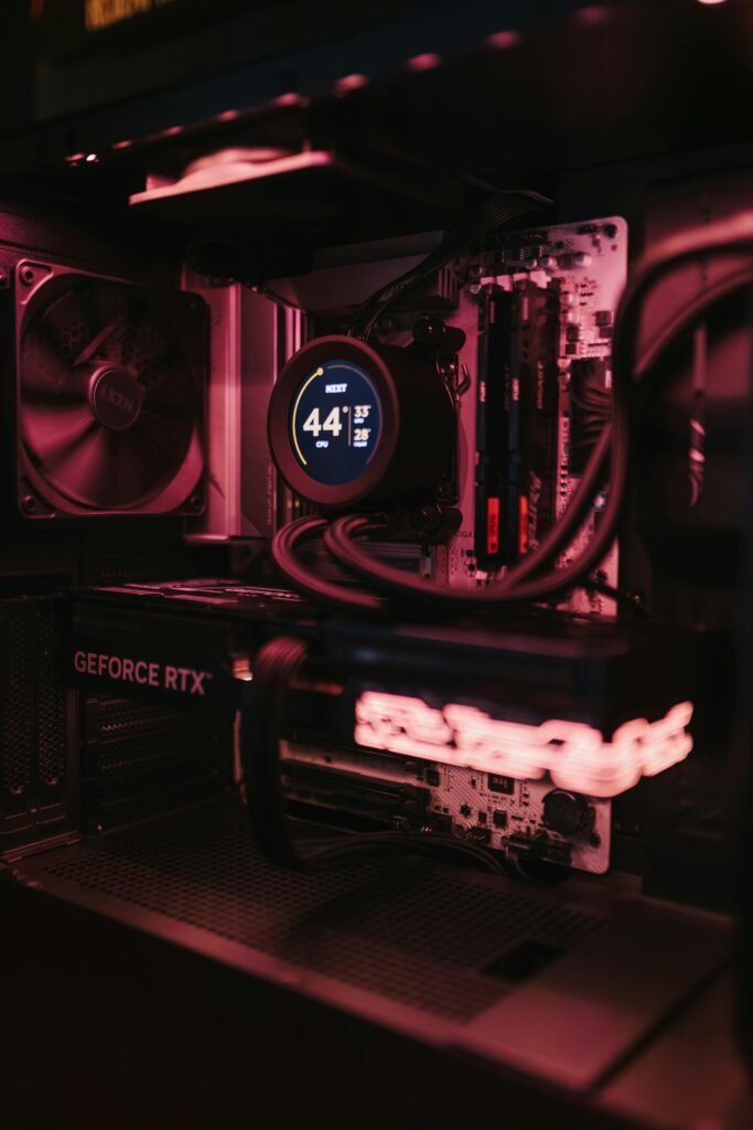 Detailed view of a gaming PC build showcasing high-performance components and cooling system.